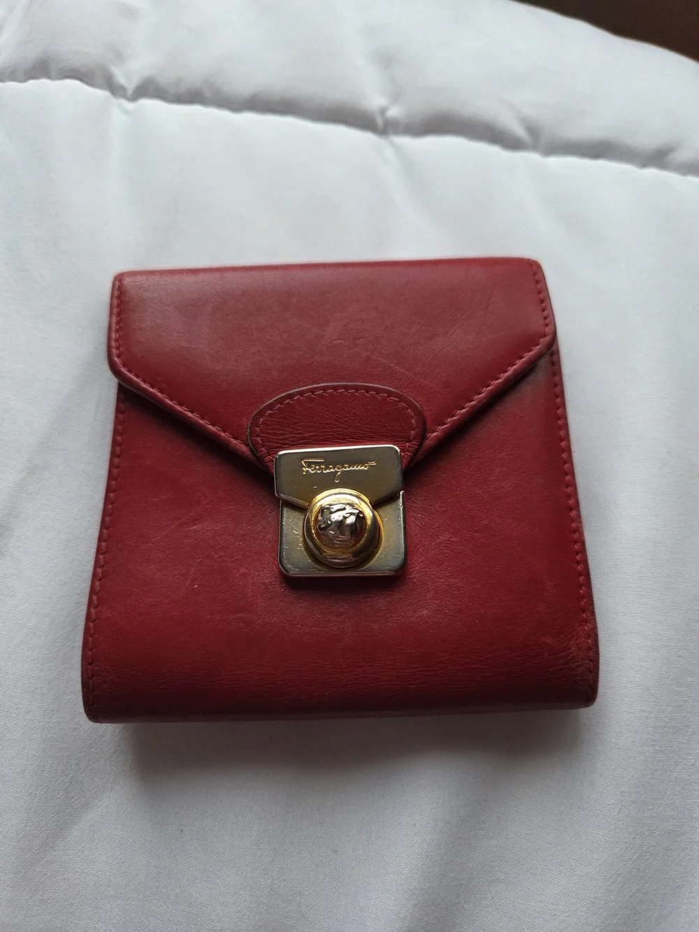 Red Leather Salvatore Ferragamo Wallet Featuring a Gold Gancini Clasp